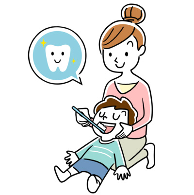 子供の歯を磨く母親